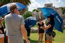 Family learning about the ancient and incredible Tulum ruins in the Riviera Maya.