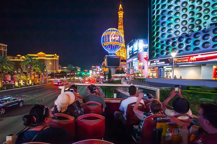 Travelers ready themselves to grab a picture of Las Vegas' take on the Eiffel Tower.